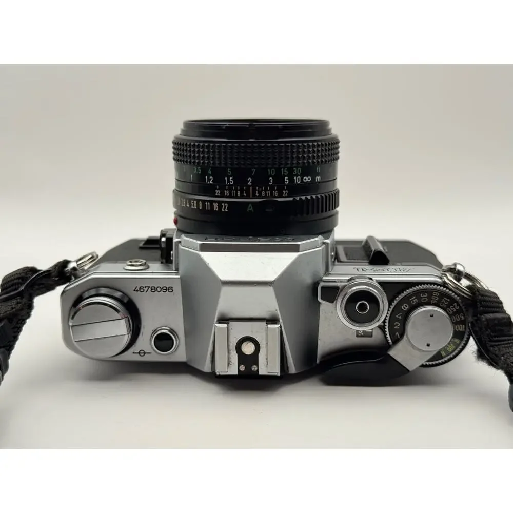 Canon AE-1 Tested 35mm SLR Film Camera Interchangeable Lens Strap Japan Vintage